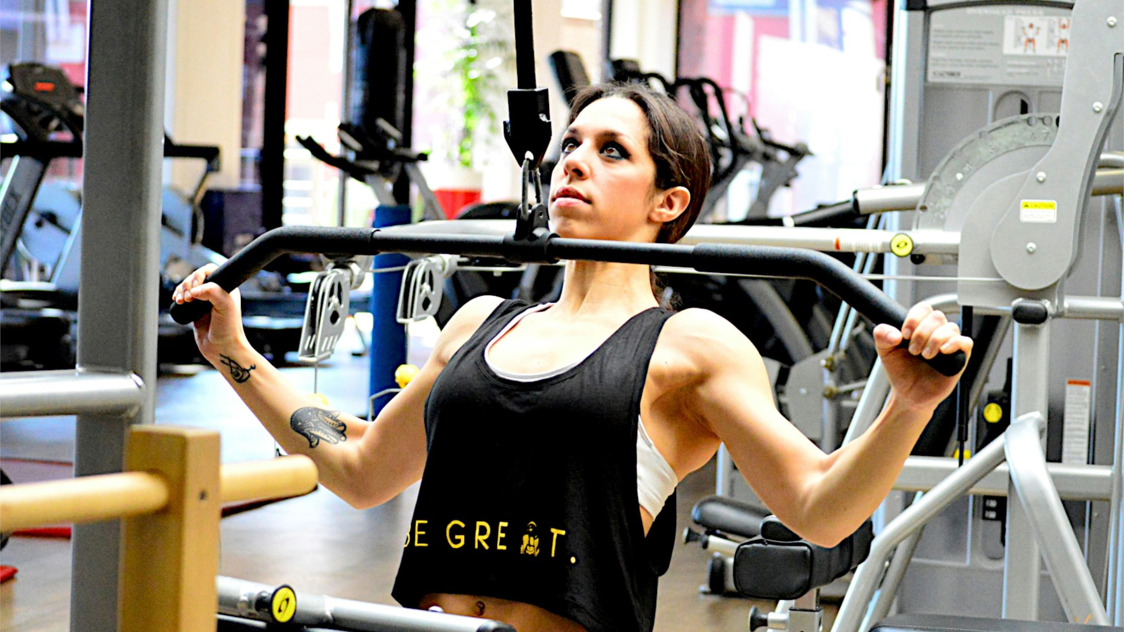 Woman doing lat pulldown exercise