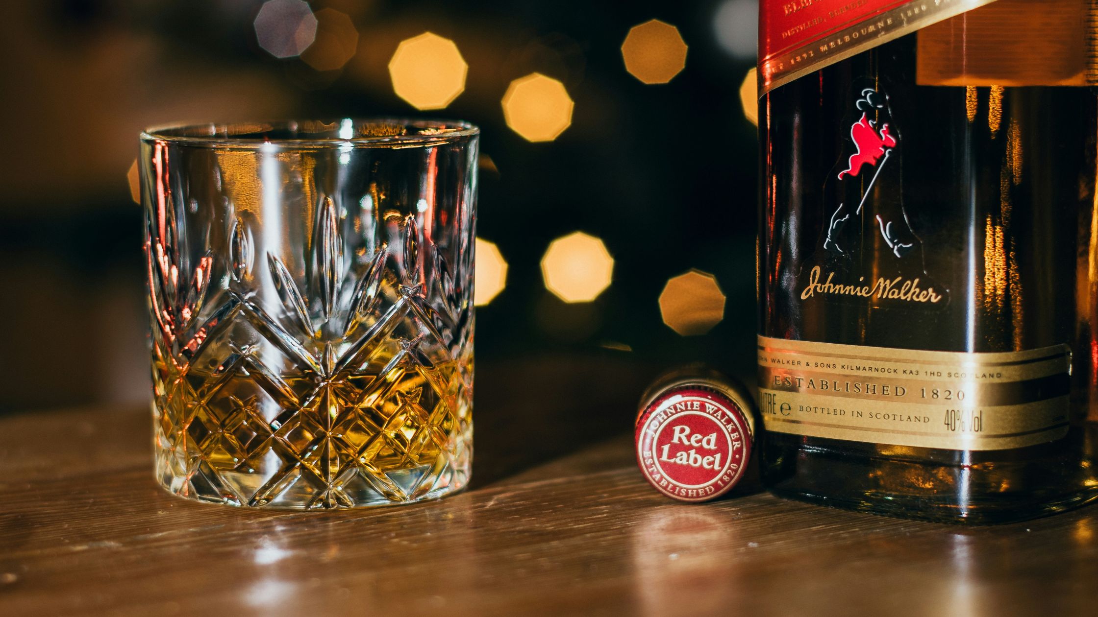 Johnnie Walker bottle with a glass full of whisky