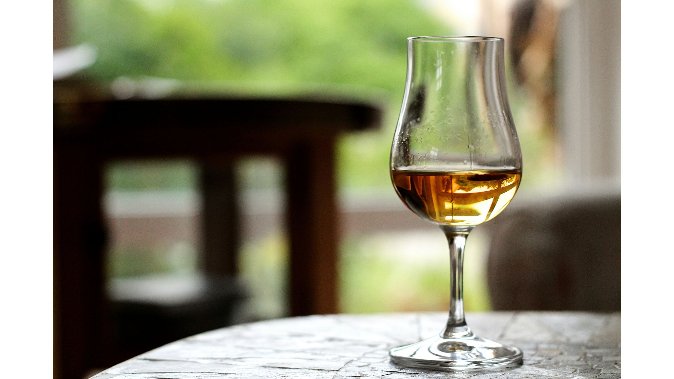 Cupita glass with whisky